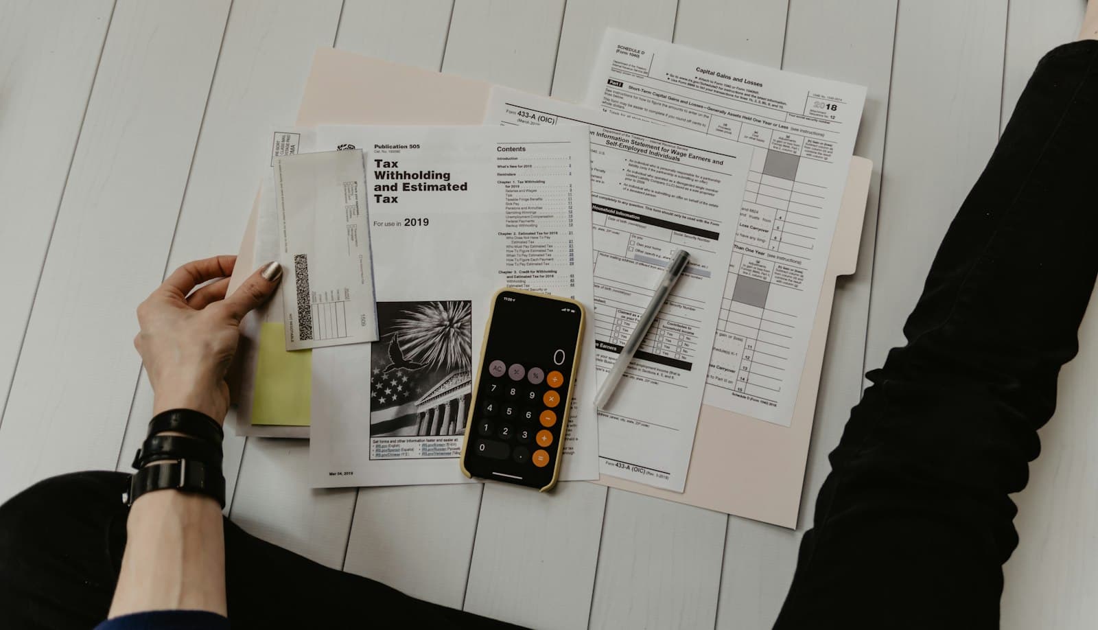 Financial documents and a calculator
