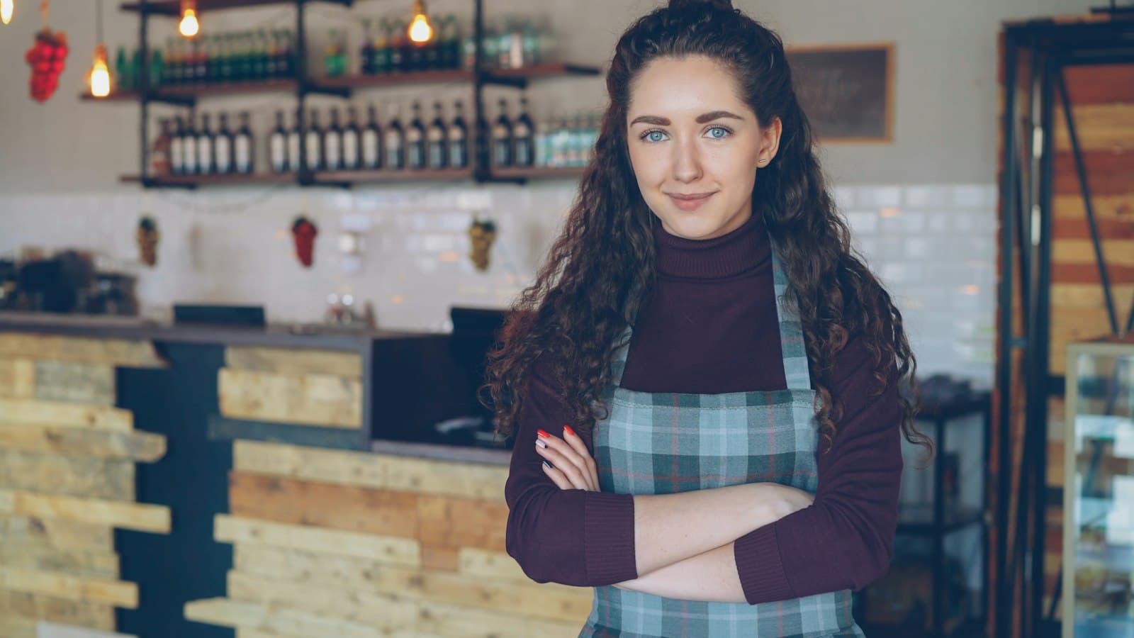 Owner standing in her coffee shop